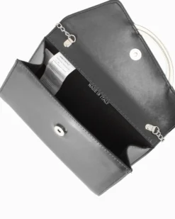 ANNES NICOLE - Pochette nera con cinturini in strass sulla patta e tracolla a catenina