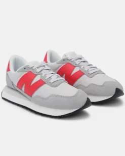 NEW BALANCE - Sneakers da uomo grigia e rossa con dettagli scamosciati - 237
