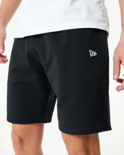 NEW ERA - Pantaloni corti neri con logo bianco