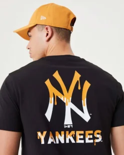 NEW ERA - T shirt girocollo da uomo nera in cotone con logo bianco e giallo