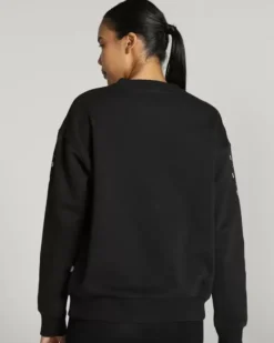 PUMA - Felpa relaxed fit da donna nera con logo bianco