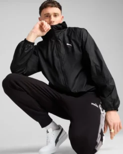 PUMA - GIUBBINO CON CAPPUCCIO FULL ZIP NERO ESSENTIAL REGULAR WINDBREA DA UOMO, 684625-01