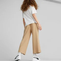 PUMA - Pantalone da donna beige a palazzo con elastico in vita e lacci