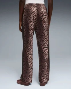 PUMA - PANTALONE DONNA LEOPARDATO NERO E MARRONE T7 LEO LUXE AOPTRACK OP,  634564-01