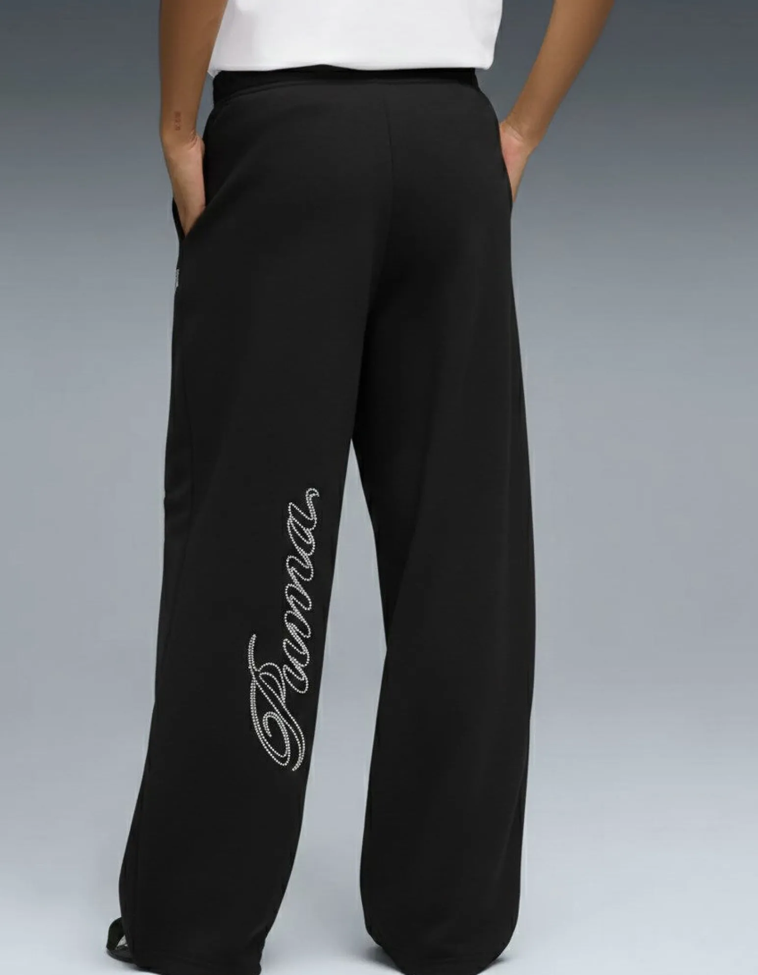 PUMA - PANTALONE DONNA NERO ESSENTIAL GRAPHIC LEO LUXE, 634567-01