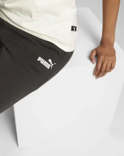 PUMA - Pantalone tuta da donna a gamba dritta nero con logo bianco