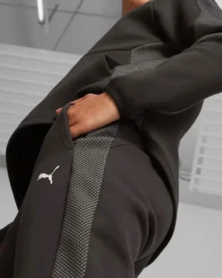 PUMA - Pantalone tuta da donna a vita alta nero in tessuto traspirante