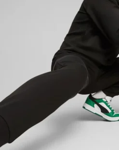 PUMA - Pantalone tuta da uomo nero con logo bianco