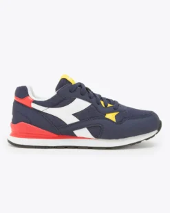 PUMA - Sneakers blu e bianca con dettagli rossi e gialli, numerata 36/39 - N 92 GS
