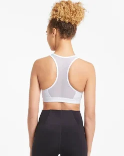 PUMA - Top bianco in tessuto traspirante con logo nero