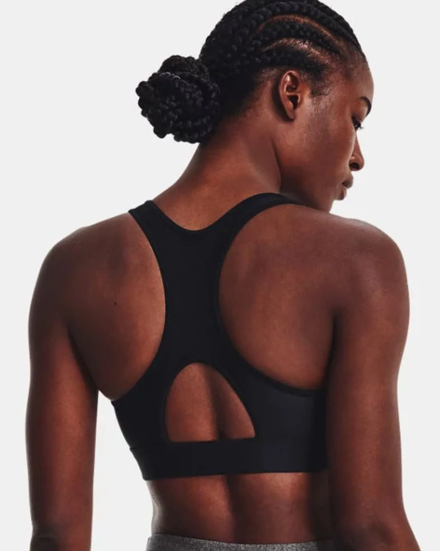 UNDER ARMOUR - Top nero ultra aderente in tessuto traspirante con logo bianco