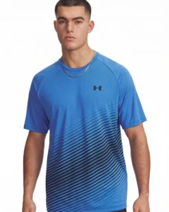 UNDER ARMOUR-T-SHIRT MEZZA MANICA TECH FADE SS BLU ROYAL CON DETTAGLI NERI DA UOMO, 6005916_402